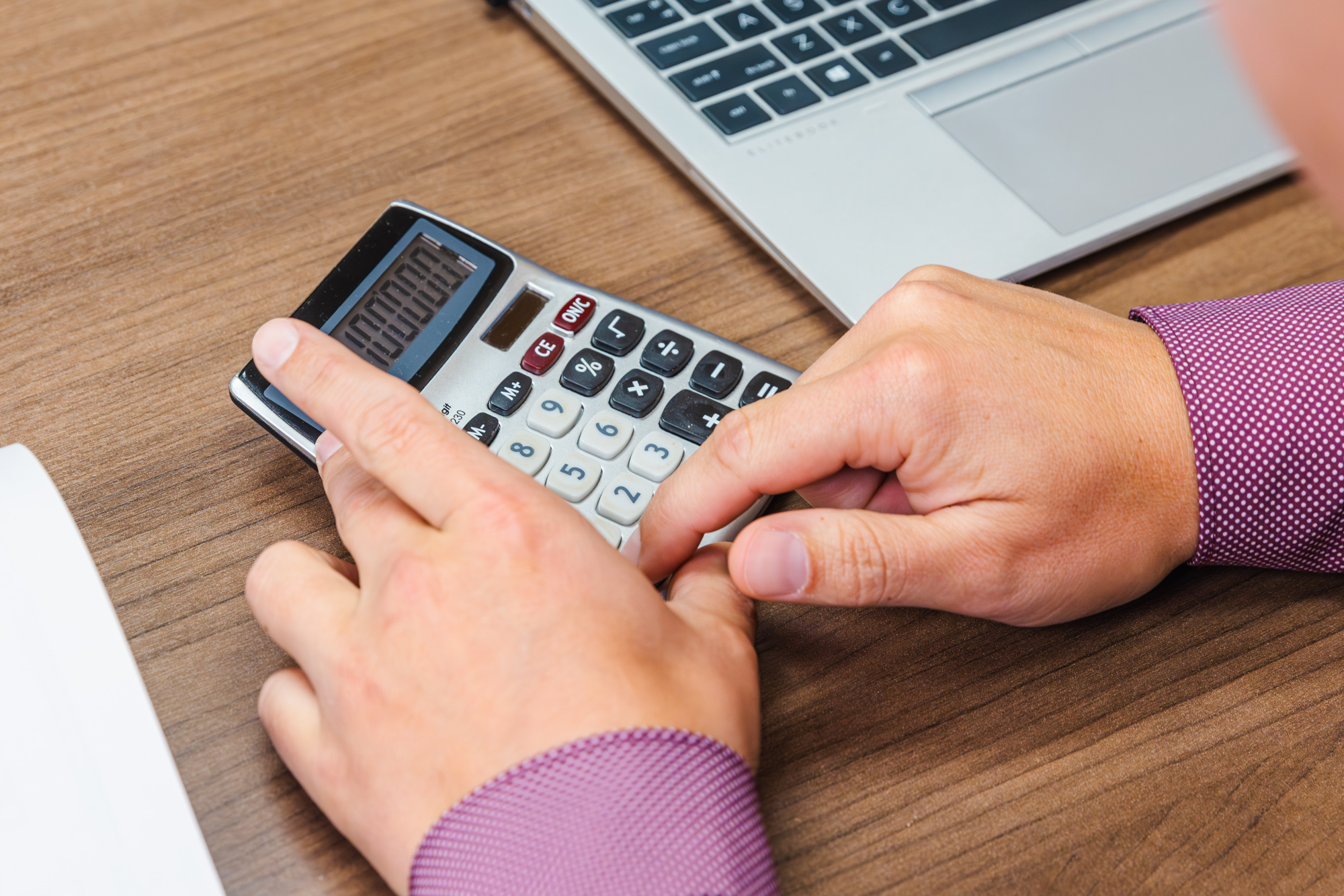 DSCR loan employee using calculator